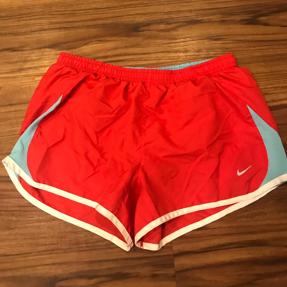 Red Nike shorts